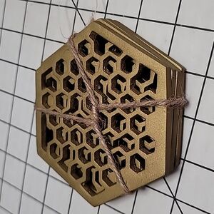 Set of 4 Metal Coasters, 4.5" at Widest, Approx..2" tall‎ Honeycomb Pattern